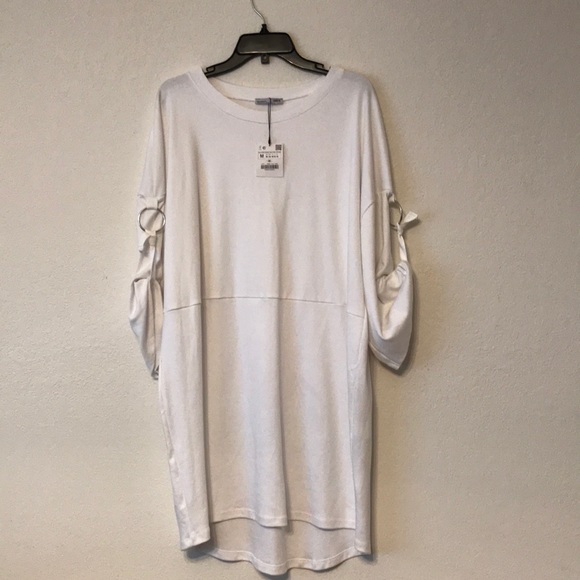 Dress with ribbons and rings - Picture 3 of 4